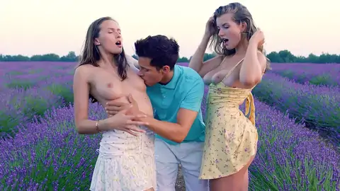 A duo of towheaded ladies have a three way with a twunk