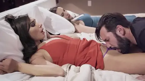 Spouse gobbling youthfull stunner's vulva next to sleeping wifey