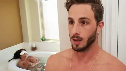 Trying to hide his full salute from the huge-chested MILF