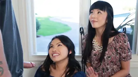 Chinese is watching while her daughter-in-law-in-law-in-law gives a hand-job