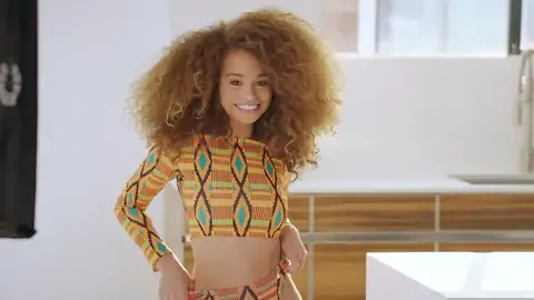 Nubile dark-hued with wavy hair is railing a big fuckpole on the sofa